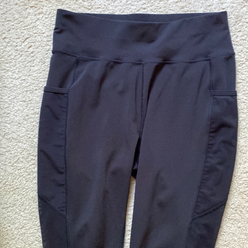 Large pop fit leggings with mesh cut outs mid thigh down
